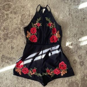black romper with rose stitching